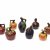 Eight liquor jugs, c1908