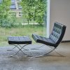 'Barcelona' easy chair with footstool, 1929 (design)