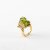 Modified cocktail ring with diamonds and peridots in ginkgo leaf look