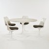 Eight 'Tulip' Chairs and a table, 1956