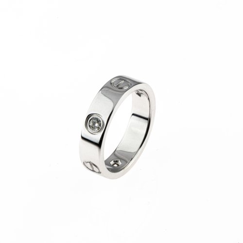 Band ring set with diamonds in 'LOVE' style