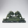 Two bookends with parrots, 1920s